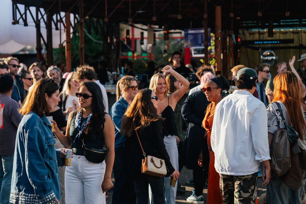 Guests socialising in The Courtyard at LIEF Amsterdam